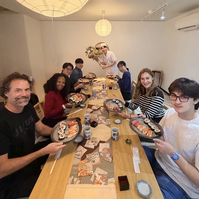 Family enjoying sushi making class together